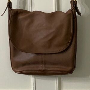 COACH leather bag. Tan/beige. Pockets, zip close, flap. “Whitney SoHo”